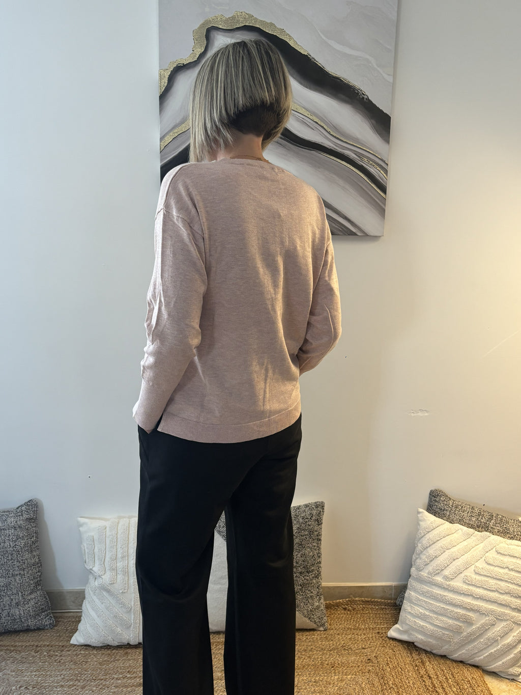 Pull rose pastel – Élégance douce et audace féminine