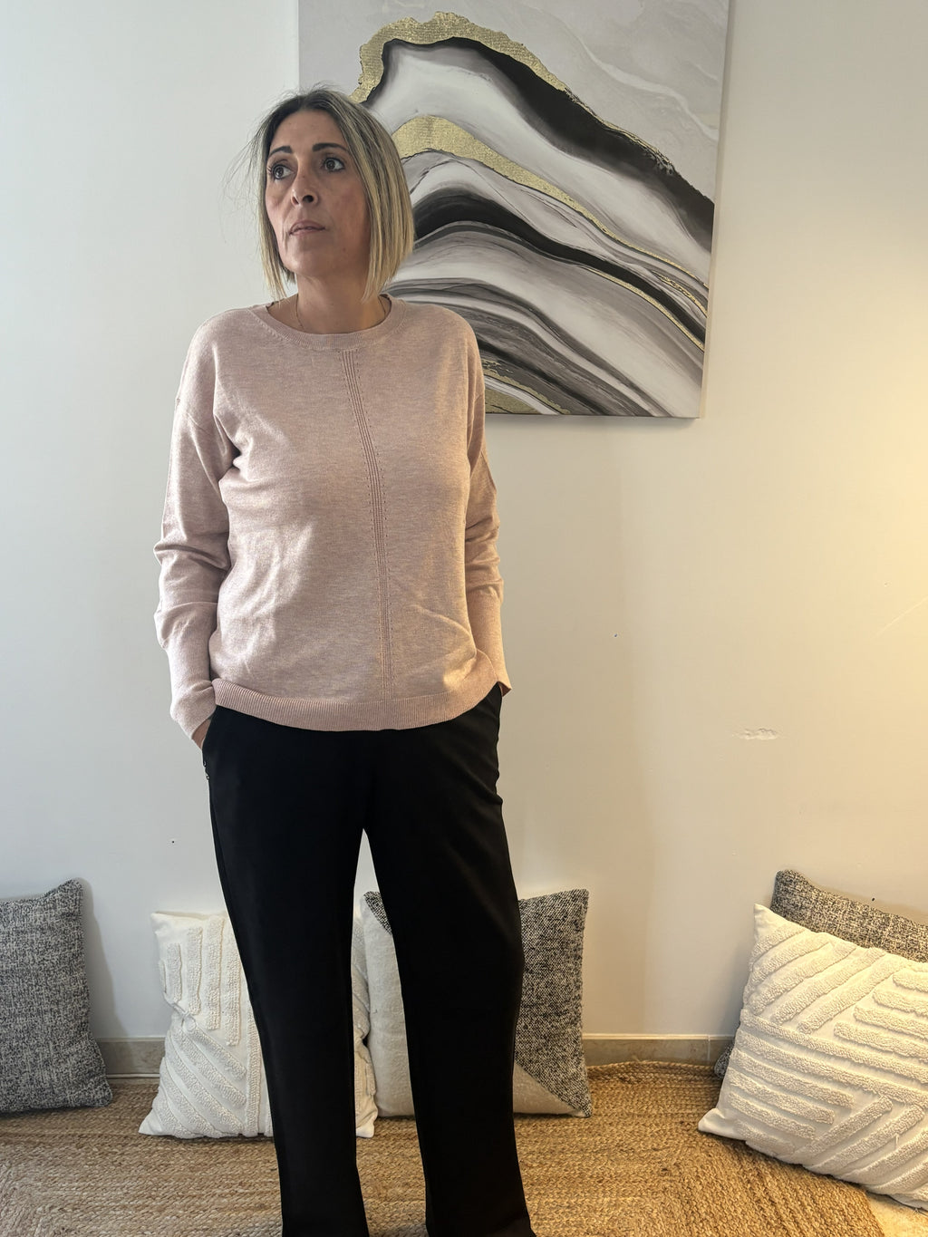 Pull rose pastel – Élégance douce et audace féminine